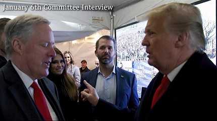 Donald Trump talking to his chief of staff Mark Meadows