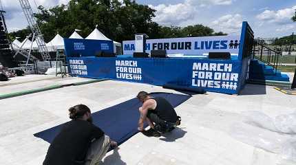 Workers set up for the March for Our Lives rally in Washington