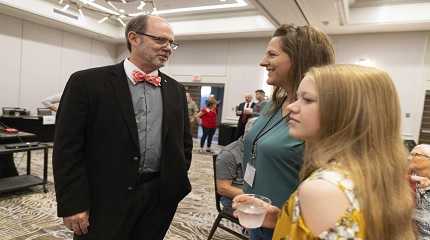 Douglas Frank with Melissa Sauder and her daughter, Anley