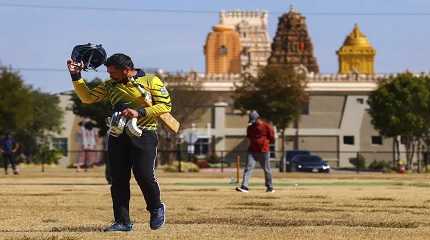 Pavan Kumar Machiraju walks off the field