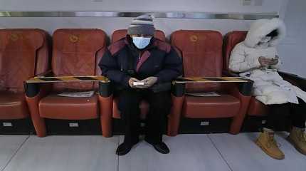 resident waits in a community health clinic