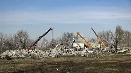 Workers clean rubbles after Ukrainian rocket strike