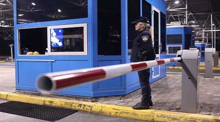 police member stands guard while the border