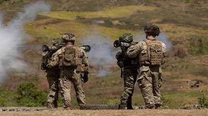 Philippine and U.S. troops fire an AT 4 84mm Anti tank