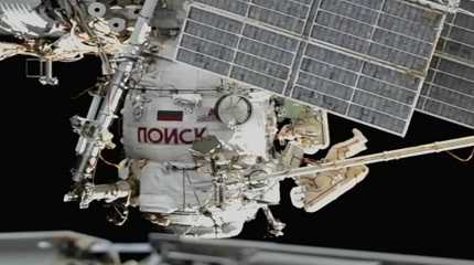 Sergey Prokopyev and Dmitri Petelin work outside the International Space Station