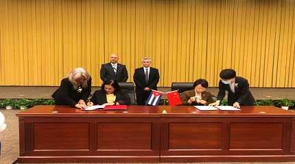 agreement was signed by Mayra Arevich and Cao Shuming