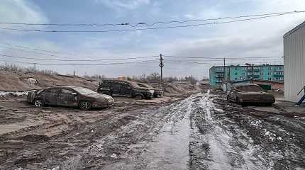 cars covered in eruption of Shiveluch volcano