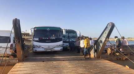 Buses carrying Sudanese