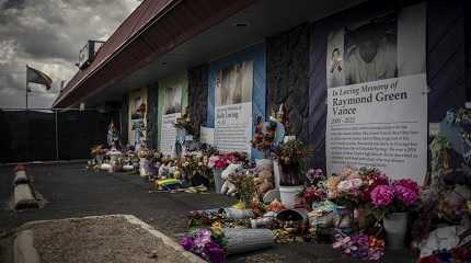 Memorials are displayed outside Club 