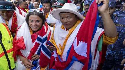 Norwegian climber Kristin Harila, left, and her Nepali sherpa guide Tenjen Sherpa