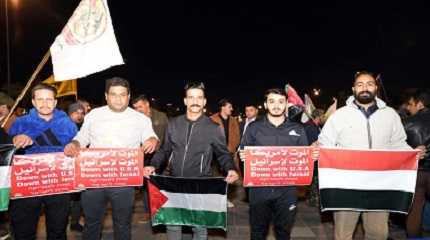 People holding banners and flags