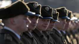 Honor guard soldiers attend a ceremony in Ukraine