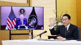 Japan's Prime Minister Fumio Kishida attends a virtual meeting with the U.S. President Joe Biden