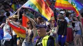 People take part in the Equality Parade