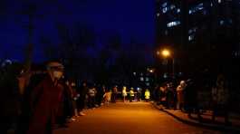 People line up to take a nucleic acid test