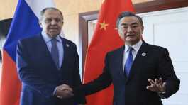 Sergey Lavrov and  Wang Yi