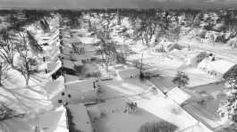 snow blankets a neighborhood