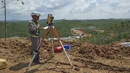 Worker uses his equipment at the construction site