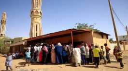 People gather to get bread