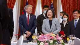 Tsai Ing-wen stands  Michael McCaul