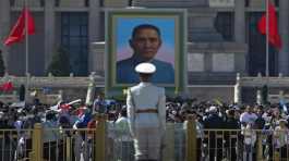 Visitors gather near a portrait of Sun Yat sen