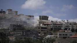 Smoke rises in the West Bank city