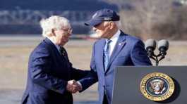 Joe Biden shakes hands Mitch McConnell