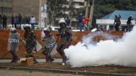 Riot police fire tear gas