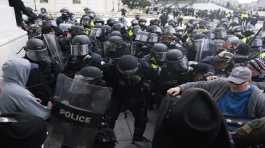 Police push back rioters